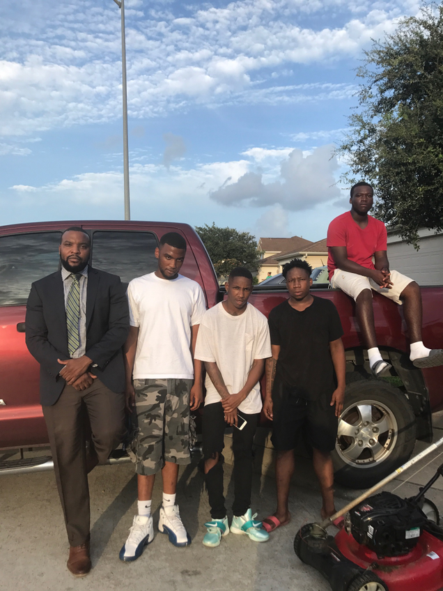Attorney Lee Merritt, Devontae Williams, Marlin Gipson, Marcus Gipson and an unidentified friend (courtesy of Lee Merritt)